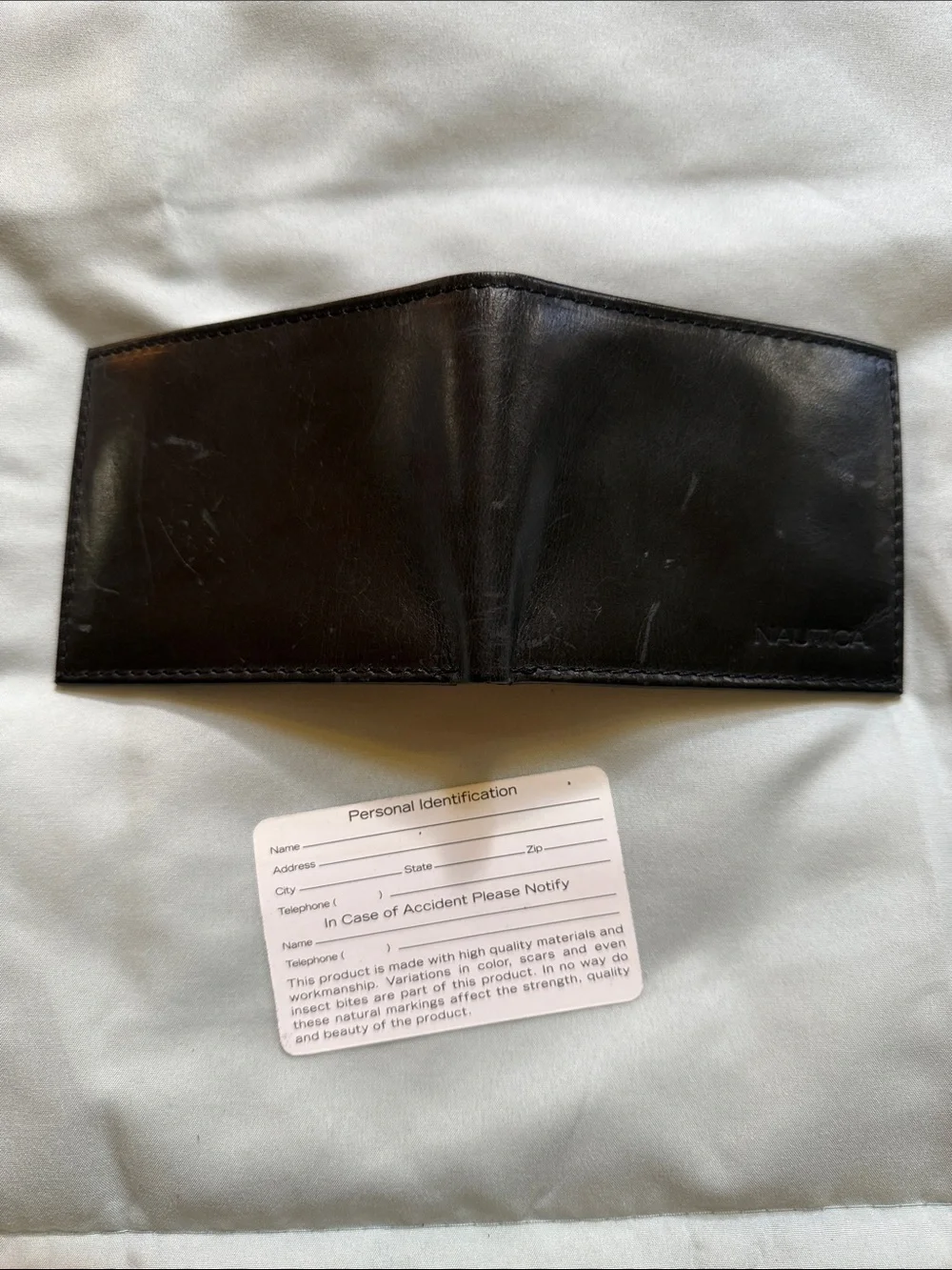 Nautica Men's Black Leather Bi-Fold Wallet